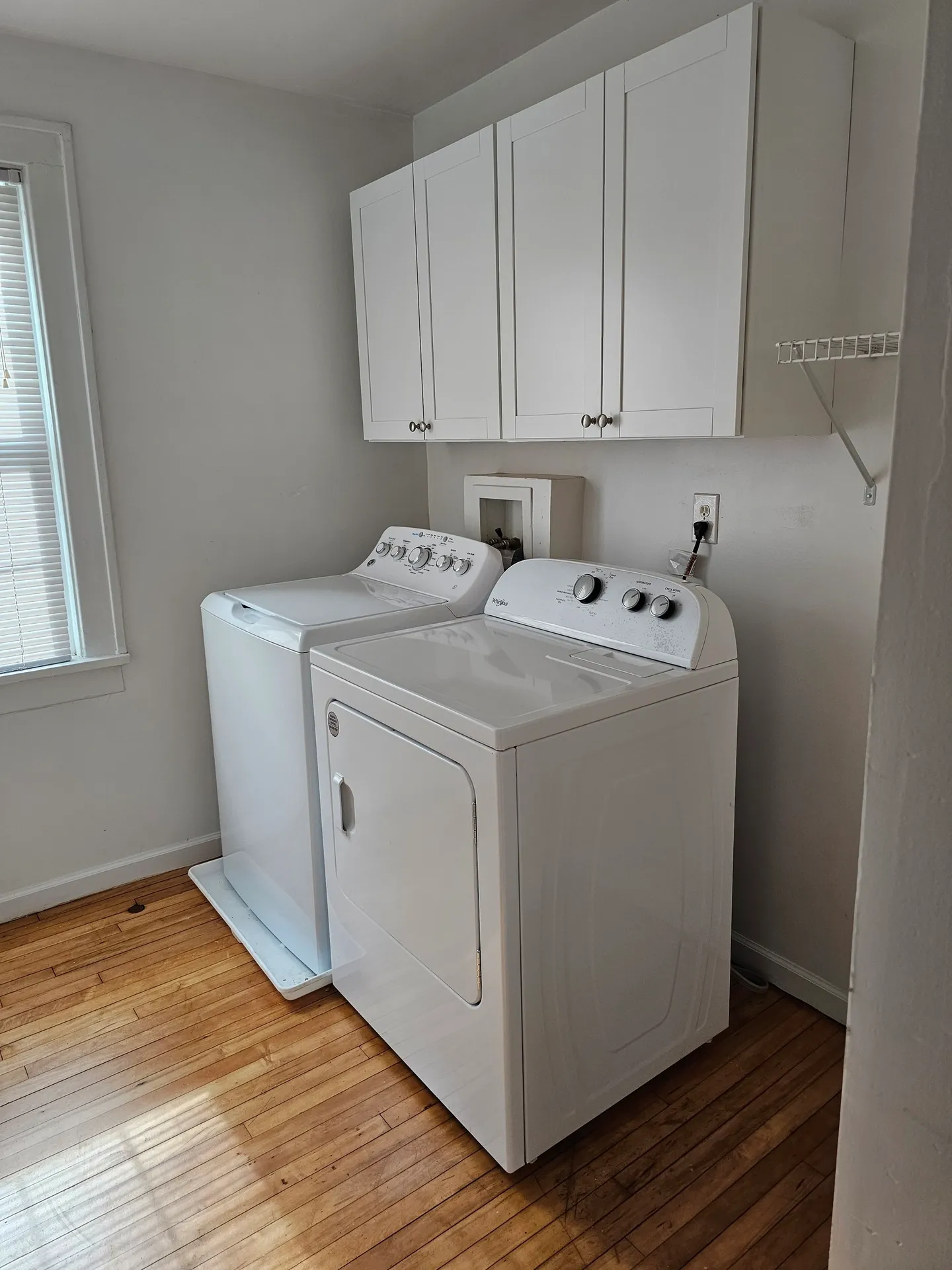 Washer and dryer in laundry room.